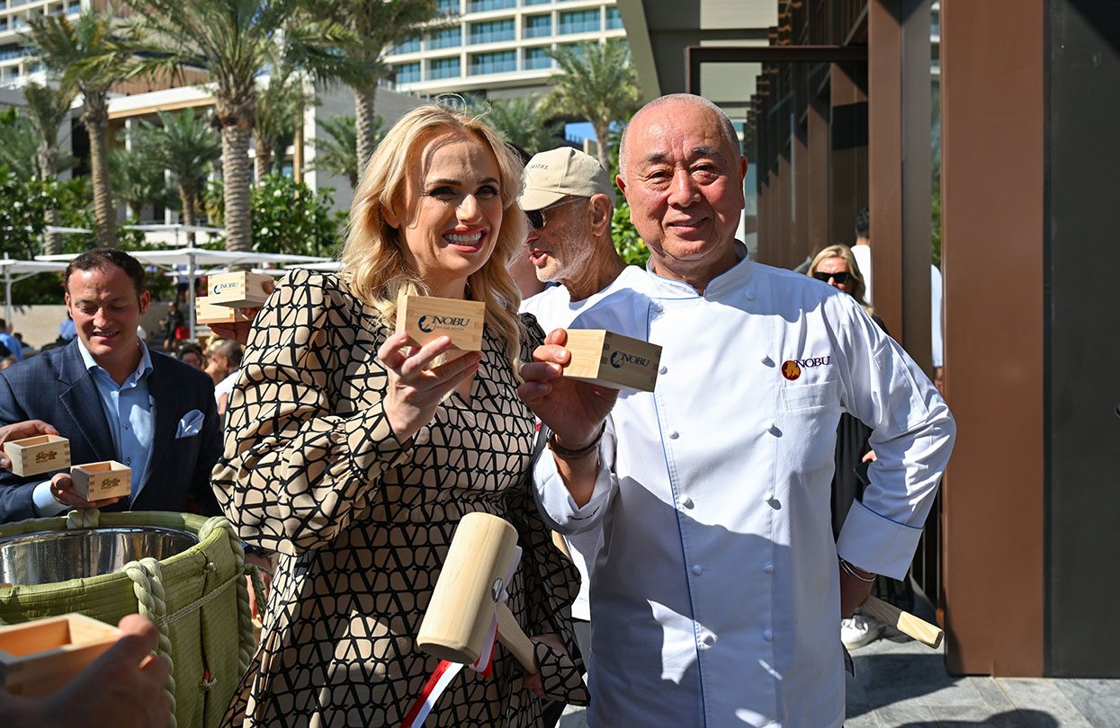 Rebel Wilson and Nobu Matsuhisa at Nobu by the Beach, Atlantis, The Royal, photo by Cedric Ribeiro, Getty Images for Atlantis The Royal