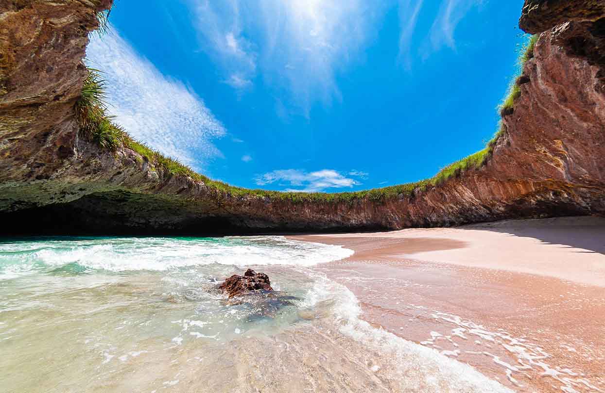 Hidden beach Marieta Island, image by miguelnaranjo, Shutterstock