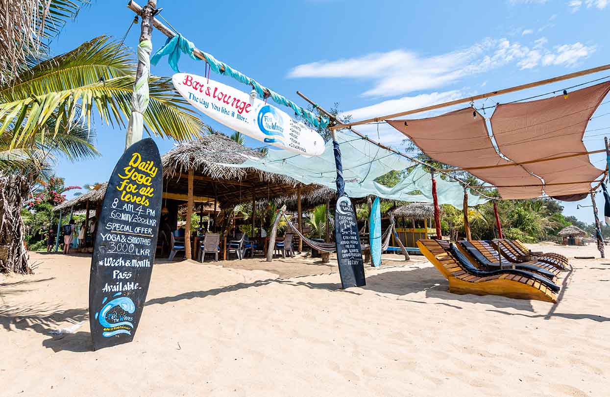 Surf lounges at Arugam Bay, image by Jon Chica, Shutterstock