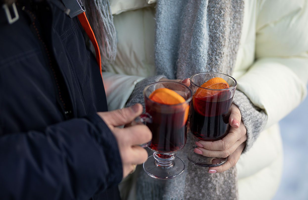 Enjoying glasses of mulled wine in Hamburg, image by Natalya Biryukova, Shutterstock