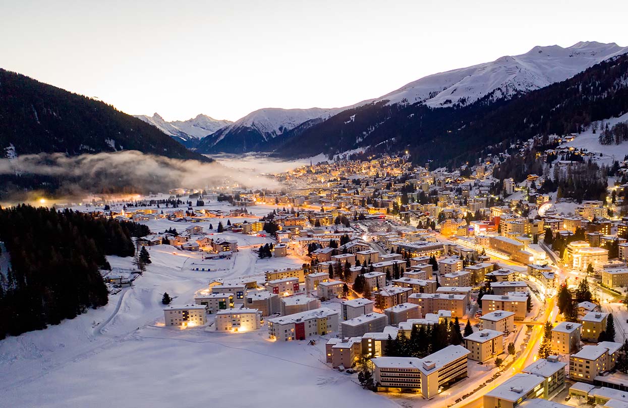 The city of Davos illuminated by the evening lights, Image Copyright Marcel Giger