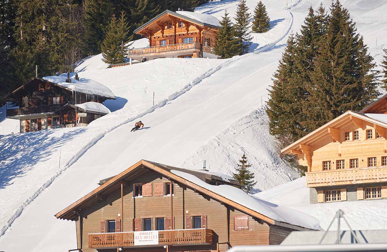 The ski trails here glide past picturesque chalets, Image Copyright Ruedi Flück, Switzerland Tourism