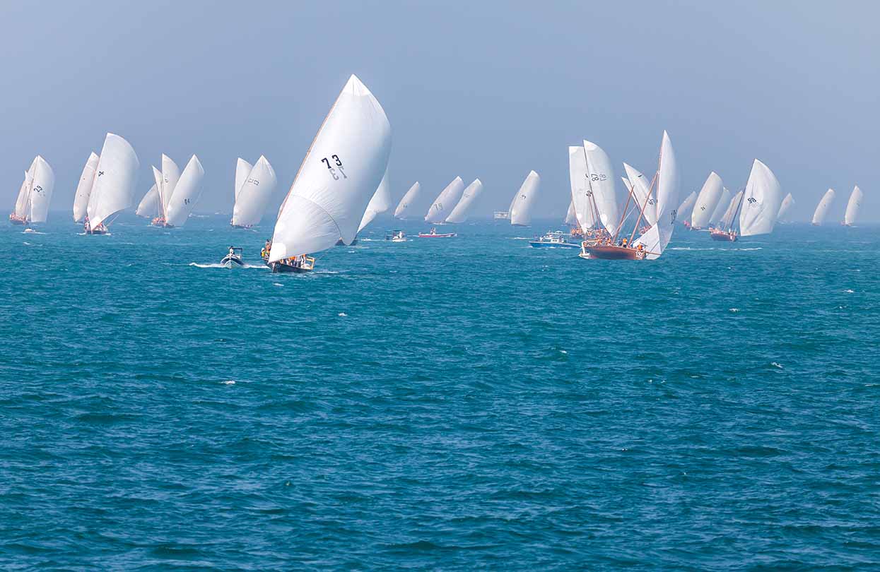 Dhow sailing race in Abu Dhabi, image by Vinnikava Viktoryia, Shutterstock