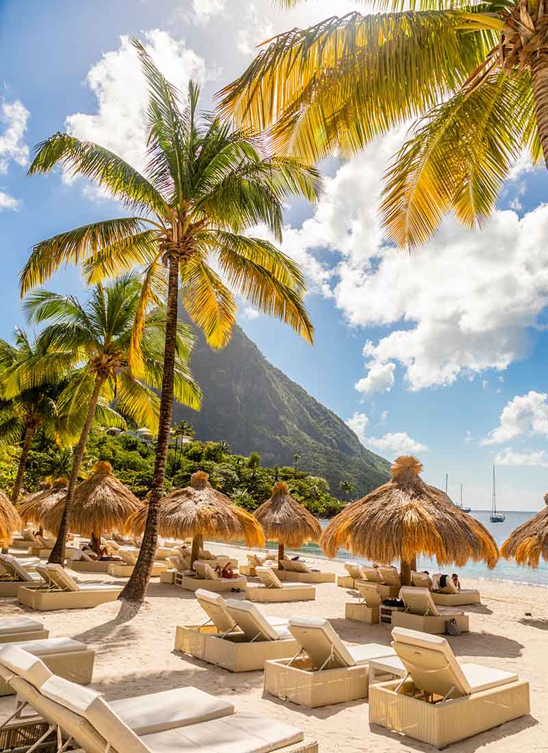 On Sugar beach with Gros Piton mountain in the background at Saint Lucia, image by Vadim_N, Shutterstock