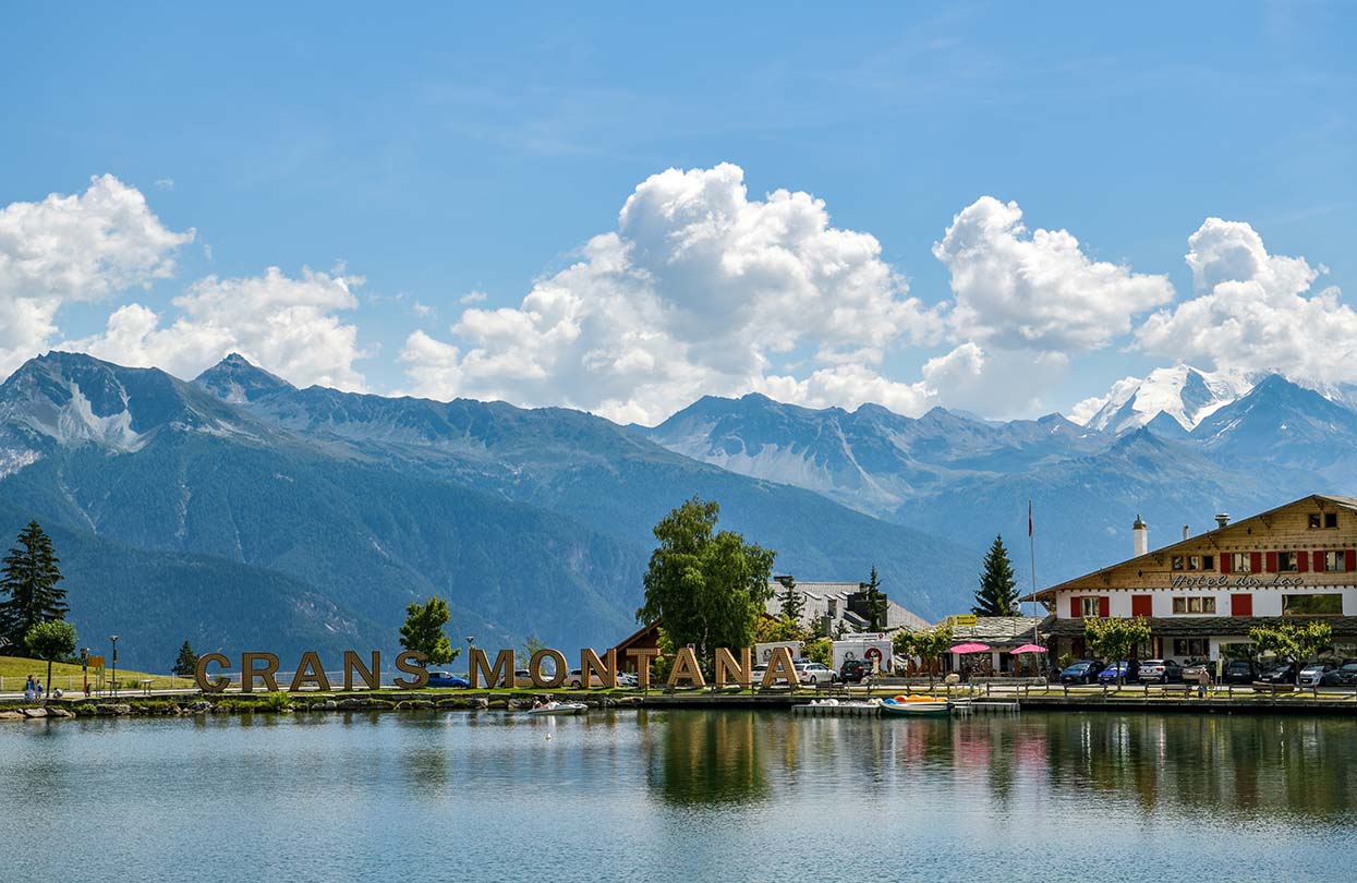 Lake in Crans Montana, image by Michal Stipek, Shutterstock