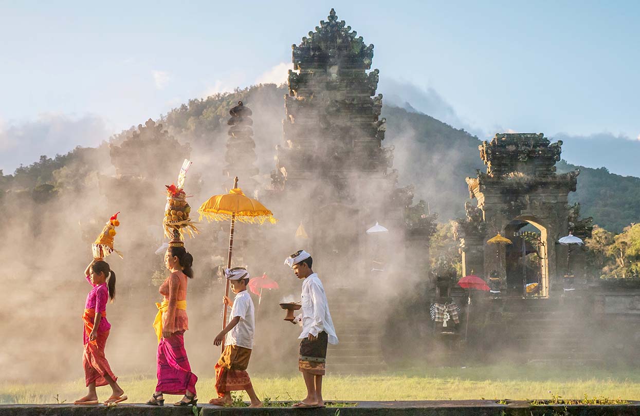 Prayer ceremony in Ubud, image by CherylRamalho, Shutterstock